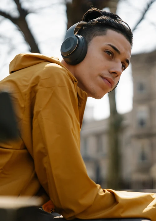 Young man with headphones on.
